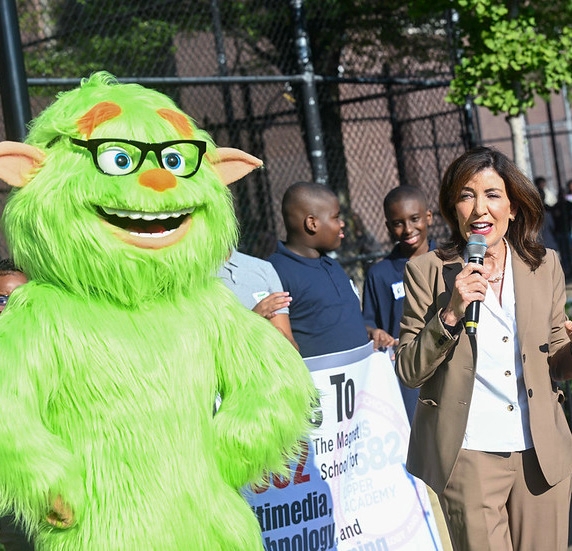 New York State Governor Kathy Kochul poses alongside “Frankie Focus,” a mascot she made to support her bell-to-bell cellphone ban in K-12 schools. Photo Courtesy of ABC7NY